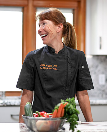 Tucson Personal Chef Maggie preparing a meal for a family